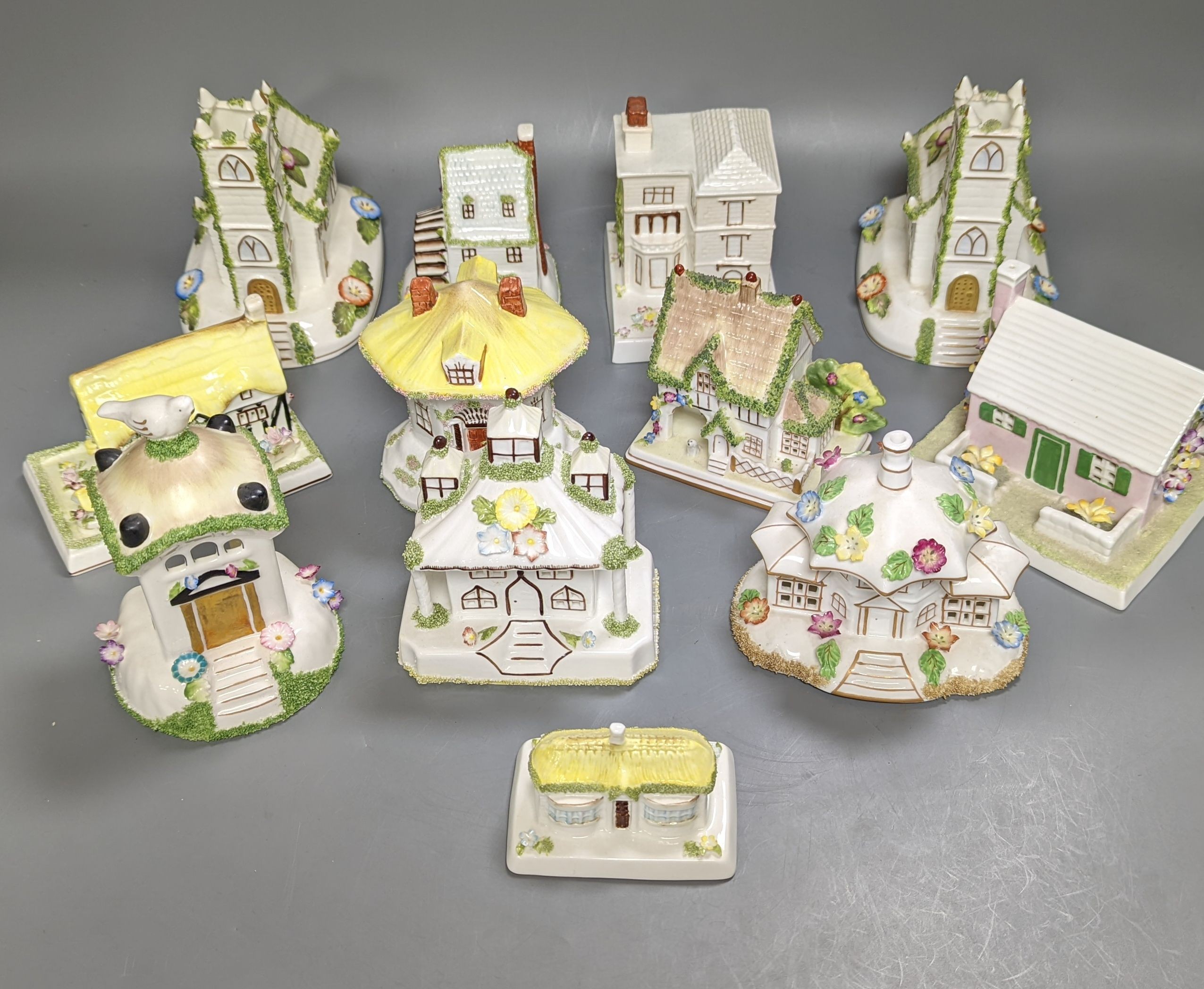 Twelve Coalport bone china pastille burner cottages and other buildings, tallest 14cms high